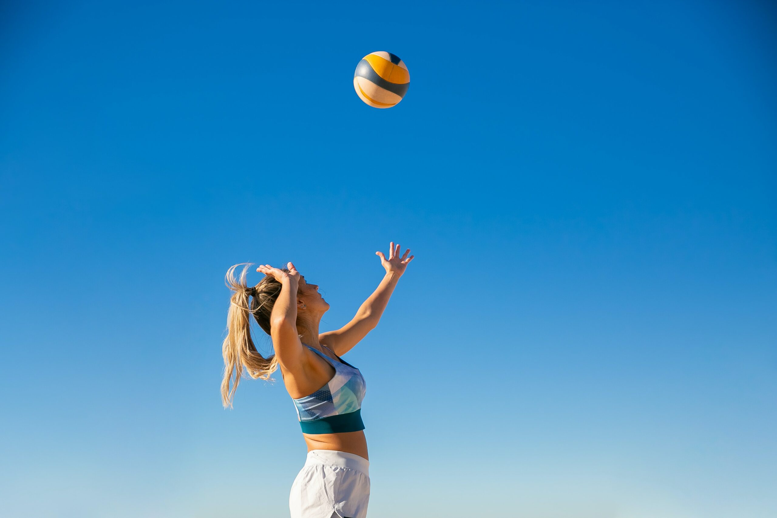 woman hitting volleyball